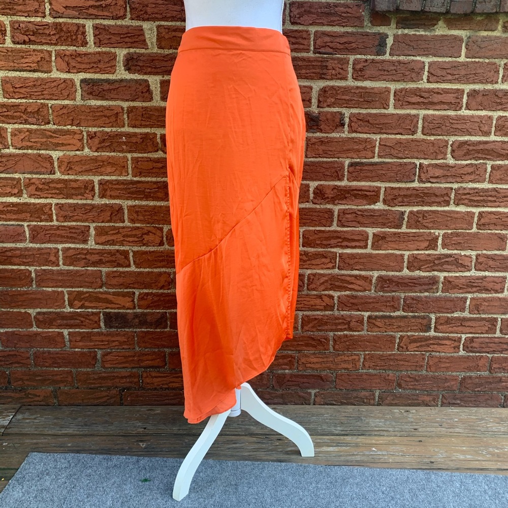 Free People asymmetric orange shirt leg slit